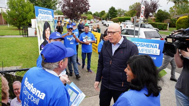 Opposition Peter Dutton and the Liberal Party candidate for Aston Roshena Campbell are seen in Lysterfield Primary School on by-election day. Picture: NCA NewsWire / Luis Ascui