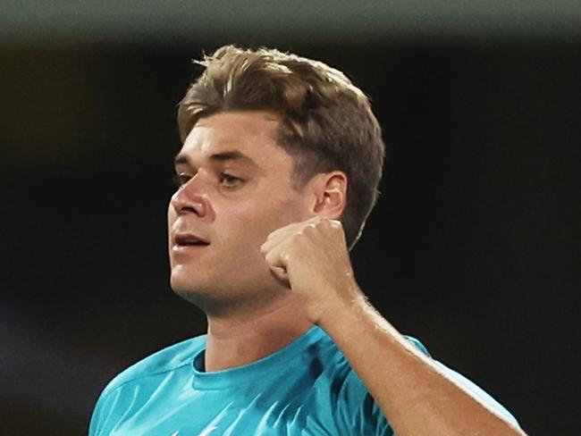 SYDNEY, AUSTRALIA - FEBRUARY 02: Spencer Johnson of the Heat celebrates taking the wicket of Dan Christian of the Sixers during the Men's Big Bash League match between the Sydney Sixers and the Brisbane Heat at Sydney Cricket Ground, on February 02, 2023, in Sydney, Australia. (Photo by Matt King/Getty Images)