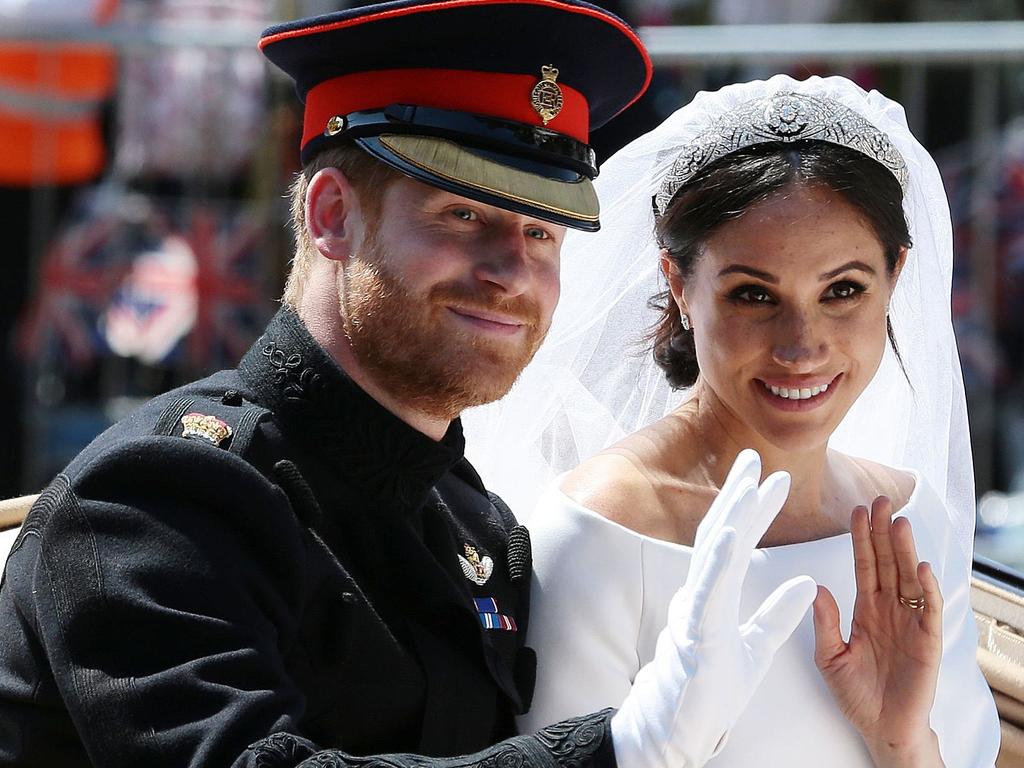 Harry and Meghan were a picture of marital bliss – but behind-the-scenes, the foundations for the current royal crisis were already laid. Picture: Aaron Chown / POOL / AFP