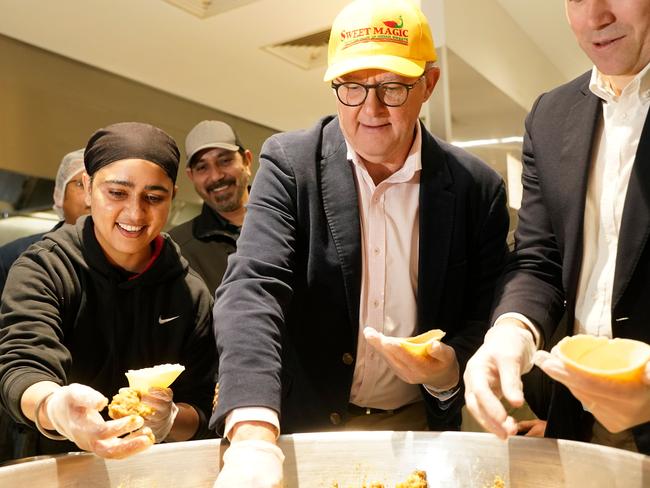 MELBOURNE,AUSTRALIA-NewsWire Photos 30 JUNE, 2024: The Prime Minister, Anthony Albanese, is in Melbourne today with the Member for Gellibrand, Tim Watts, and will visit Sweet Magic in Truganina.They are assisted in the factory by Ashwinder Kaur.  Picture: NCA NewsWire / Valeriu Campan