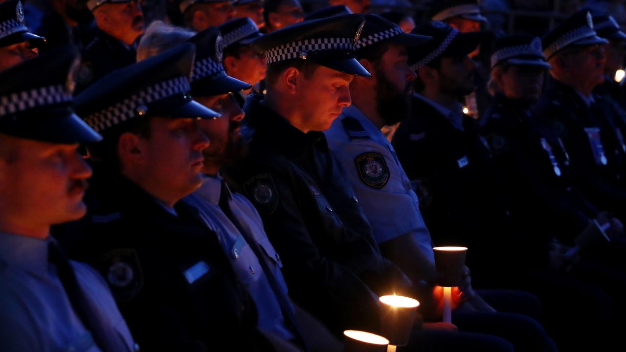 Police officers attend a community candlelight vigil for the victims of the Bondi Junction tragedy. Picture: Getty Images