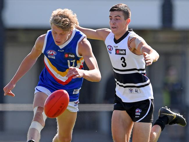 Cody Hirst gets a kick away against Northern Knights. Picture: Andy Brownbill