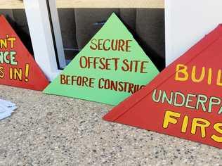 Koala activist signs outside the planning meeting yesterday. Picture: Rick Koenig