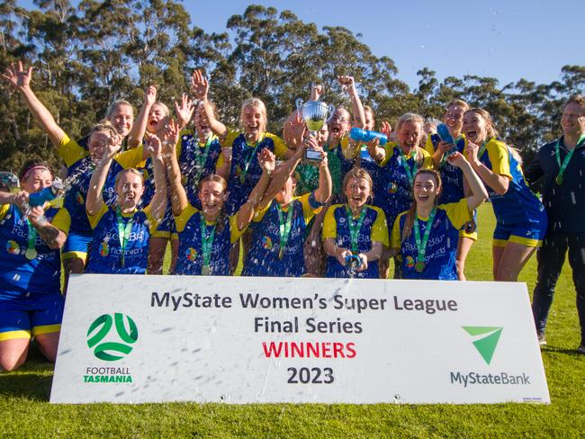 The Devonport Strikers celebrate after their WSL Grand Final win against Clarence Zebras. Picture: Anthony Corke