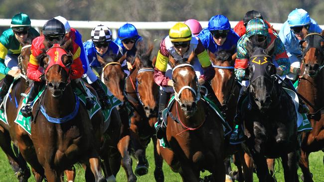 Loving home ridden by Tye Angland  (yellow cap, maroon with yellow armbands) wins race 1 during Scone  Races located in the Upper Hunter Region of NSW. The Bend . Pic Jenny Evans