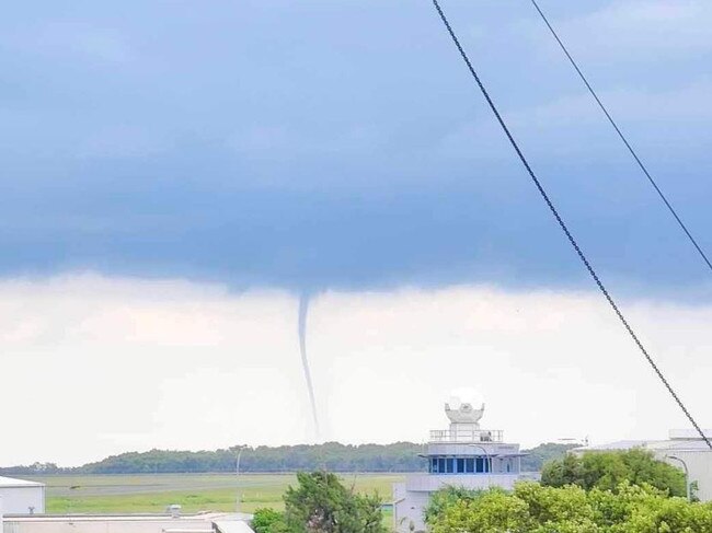 A water spout over Moreton Bay this afternoon as seen from the Brisbane Airport. Picture: Elise M/Facebook