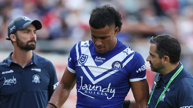 SYDNEY, AUSTRALIA - MARCH 08:  Stephen Crichton of the Bulldogs is attended to by trainers during the round one NRL match between St George Illawarra Dragons and Canterbury Bulldogs at Netstrata Jubilee Stadium, on March 08, 2025, in Sydney, Australia. (Photo by Mark Metcalfe/Getty Images)