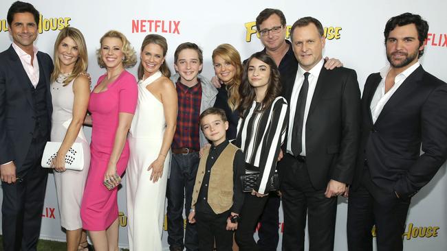 Fuller House cast from left John Stamos, Lori Loughlin, Jodie Sweetin, Andrea Barber, Michael Campion, Candace Cameron Bure, Elias Harger, Soni Bringas, Bob Saget, Dave Coulier and Juan Pablo Di Pace. Picture: Splash