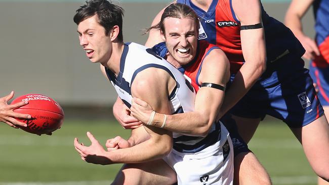 Keenan Posar takes down Geelong’s Jack Henry during his time at Coburg. Picture: Glenn Ferguson