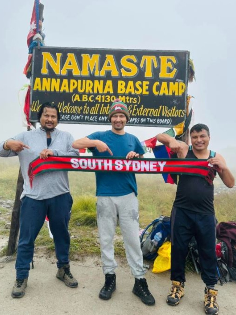 Arriving at Annapurna Base Camp in Nepal was the perfect occasion for a Random Souths Guy moment for this loyal supporter. Picture: supplied