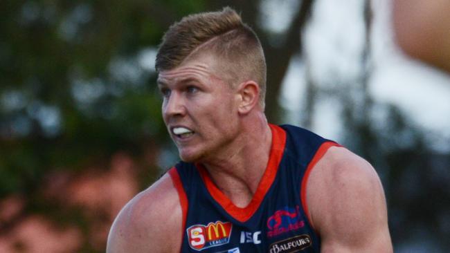 SANFL: Eagles v Norwood at Woodville Oval, Saturday, May 19, 2018. Norwoods Joshua Glenn gets a kick away.  (AAP Image/ Brenton Edwards)