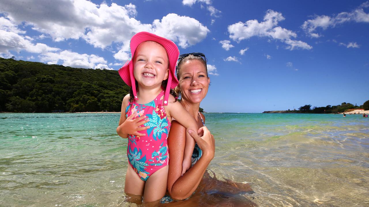 Kristin Sutton and daughter Layla Sutton, 3 enjoying the beautiful Tallebudgera Creek as Queensland braces for a bumper Easter. Picture: Adam Head.