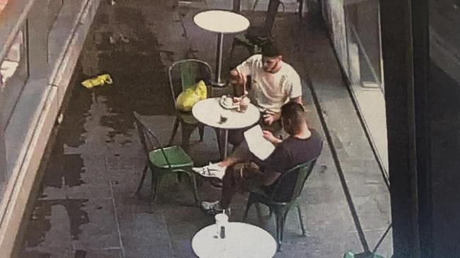 Surveillance footage of lawyer Chris Eliopoulos and Torek Ayoub. There is no suggestion Mr Eliopoulos was involved in any criminal activity.