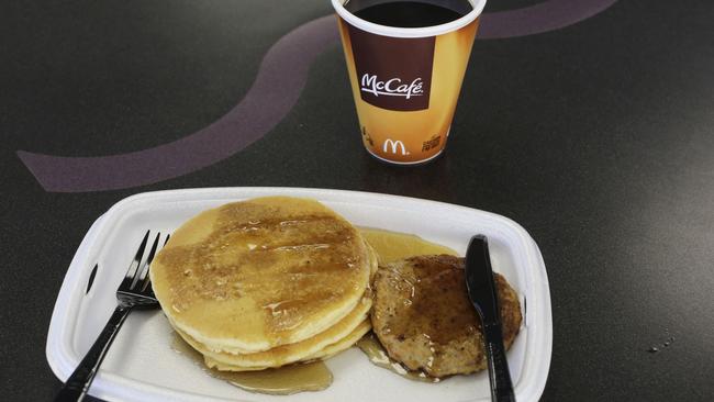 FILE- In this Feb. 14, 2013, photo, a McDonald's breakfast is arranged for an illustration at a McDonald's restaurant in New York. McDonald’s says its breakfast menu will be available all day starting Oct. 6, 2015. (AP Photo/Mark Lennihan, File)