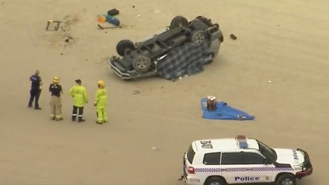 A French tourist has died and four others were hospitalised after a 4WD rollover at Teewah Beach on Sunday afternoon. Photo: Nine News