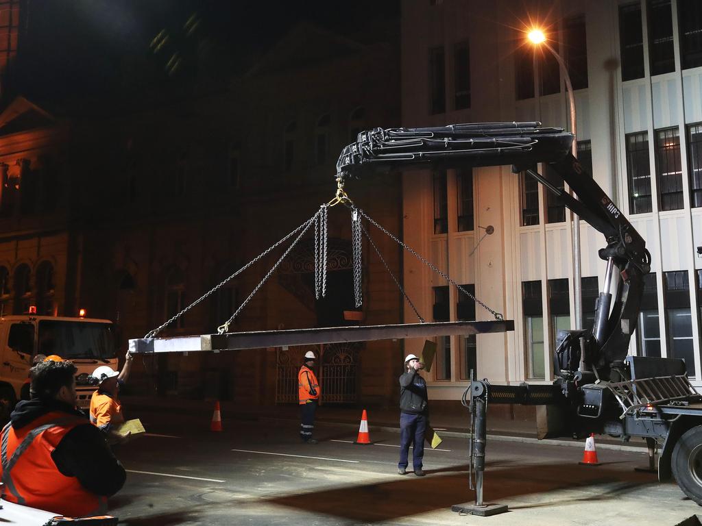 Work in Macquarie Street Hobart on the hole that will house the chamber performance artist Mike Parr will live in for 72 hours during Dark Mofo. Picture: NIKKI DAVIS-JONES