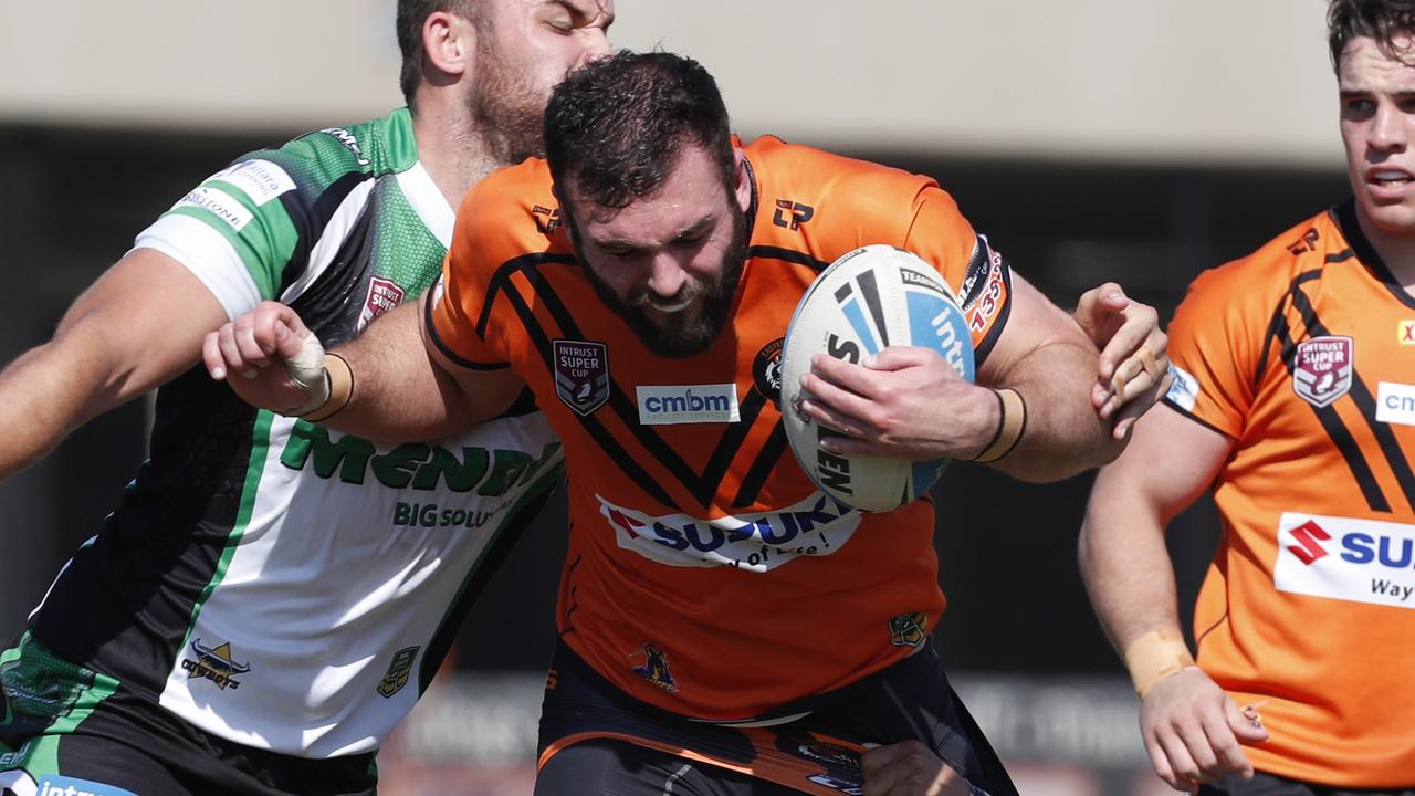 Mark Nicholls on the charge for Easts Tigers in the INtrsut Super Cup in 2017. Picture: AAP Image/Regi Varghese