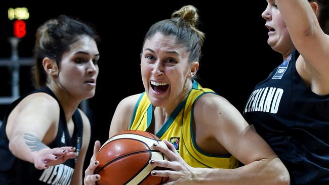 Katie Rae Ebzery of the Opals with Beck Stella and Penina Davidson of the Ferns.