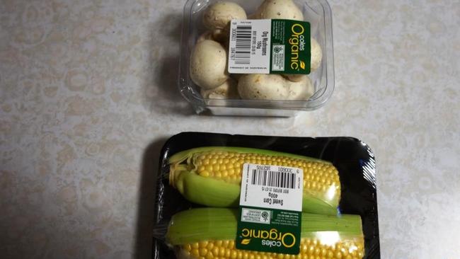 Plastic wrapped supermarket vegetables. Part of a story about too much plastic wrap on small fresh produce.