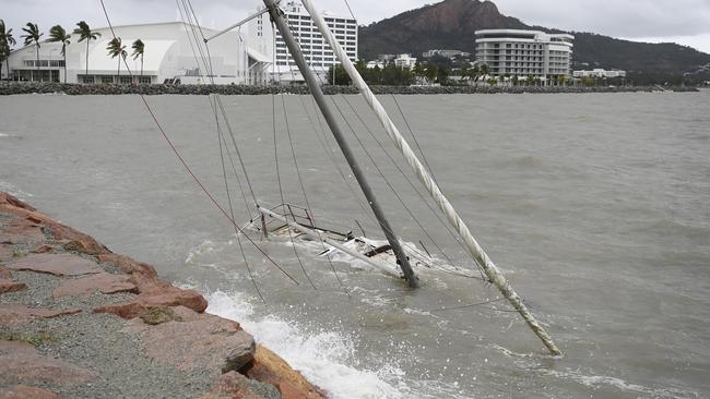 TOWNSVILLE, AUSTRALIA - JANUARY 26:  A sunken yacht is seen on January 26, 2024 in Townsville, Australia. A cyclone watch zone has been issued for large parts of north Queensland, as tropical Cyclone Kirrily made landfall near Townsville on Thursday. The cyclone was downgraded after it crossed the coast, but still left behind significant flooding. (Photo by Ian Hitchcock/Getty Images)