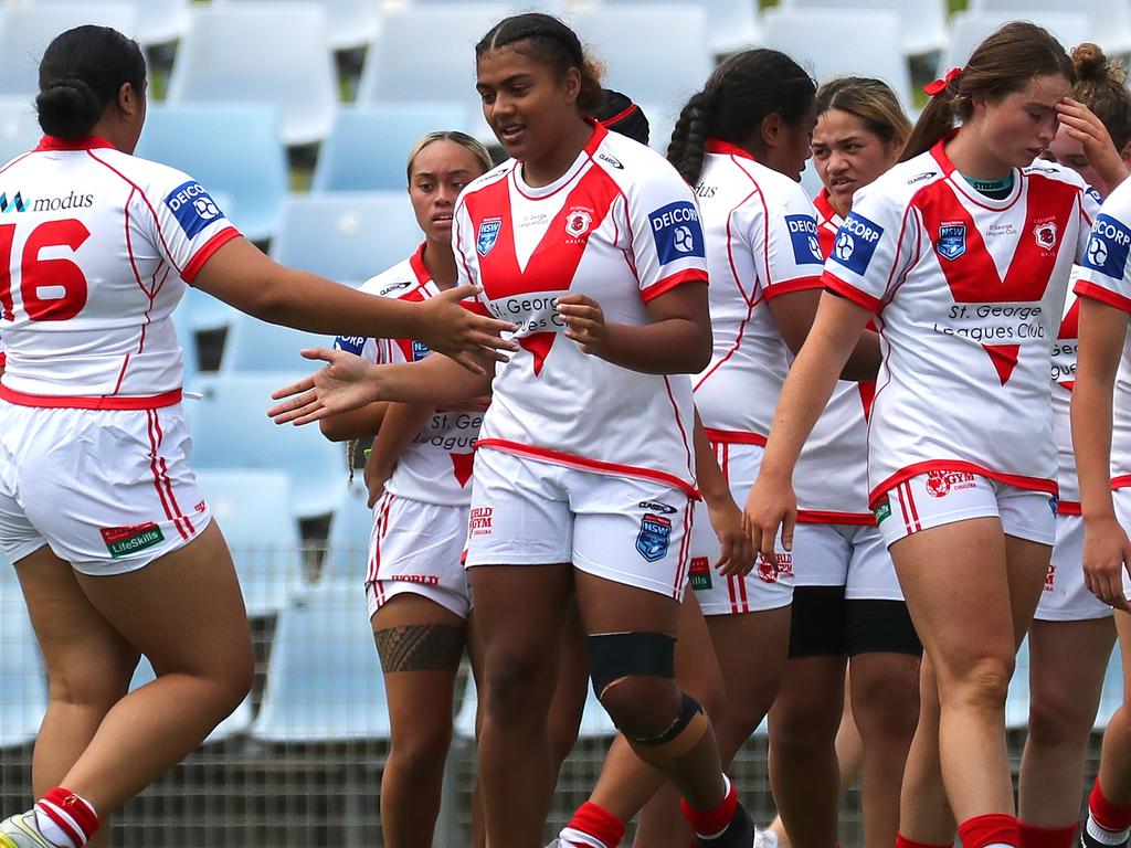 The Dragons celebrate scoring a try against the Cronulla Sharks earlier this season. Photo: Jeremy Ng / Newscorp