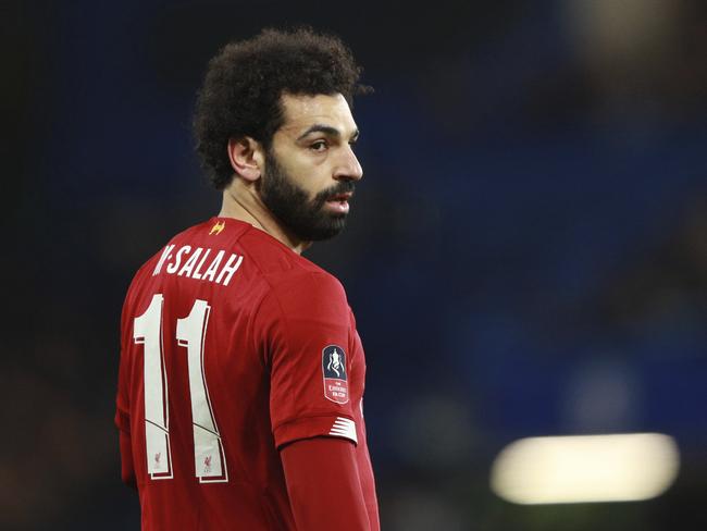 Liverpool's Mohamed Salah reacts during the English FA Cup fifth round soccer match between Chelsea and Liverpool at Stamford Bridge stadium in London Tuesday, March 3, 2020. (AP Photo/Ian Walton)