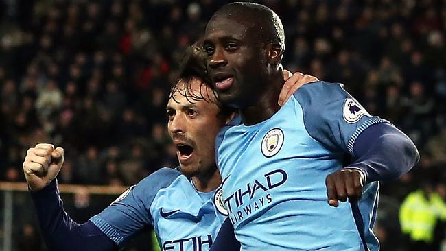 HULL, ENGLAND - DECEMBER 26: Yaya Toure of Manchester City celebrates scoring the opening goal with David Silva during the Premier League match between Hull City and Manchester City at KCOM Stadium on December 26, 2016 in Hull, England. (Photo by Nigel Roddis/Getty Images)