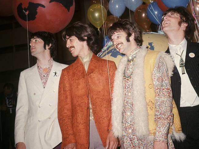 The Fab Four celebrating the release of their genre-bending album. Picture: AP/