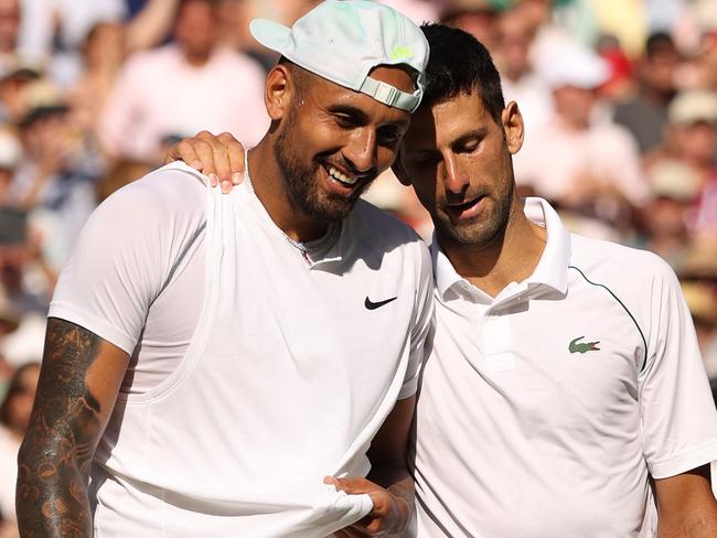 LONDON, ENGLAND - JULY 10: Winner Novak Djokovic of Serbia (R) and runner up Nick Kyrgios of Australia interact by the net following their Men's Singles Final match on day fourteen of The Championships Wimbledon 2022 at All England Lawn Tennis and Croquet Club on July 10, 2022 in London, England. (Photo by Ryan Pierse/Getty Images)