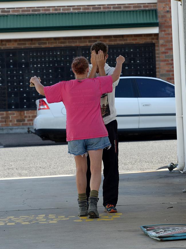 Emotional friends of the victim in Wickham, Newcastle, where a man was shot dead. Picture by Peter Lorimer.