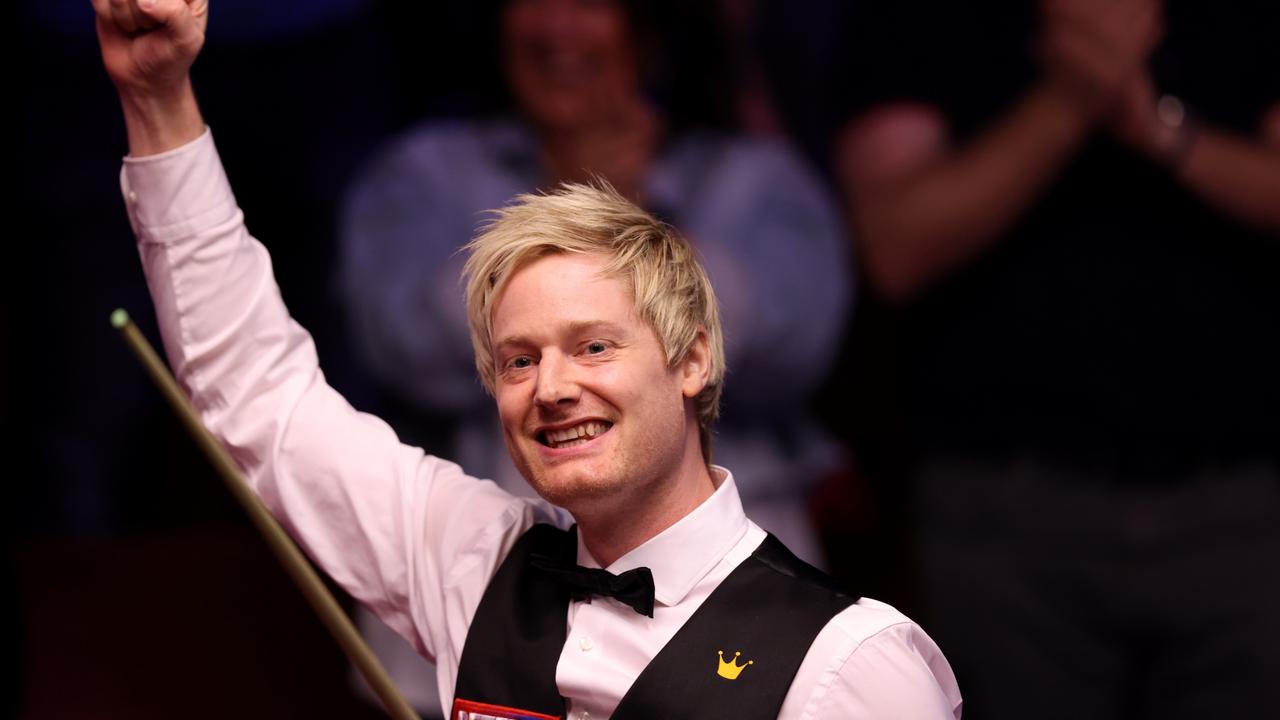 Neil Robertson celebrates after making a 147 during the World Snooker Championships. (Photo: George Wood/Getty Images)