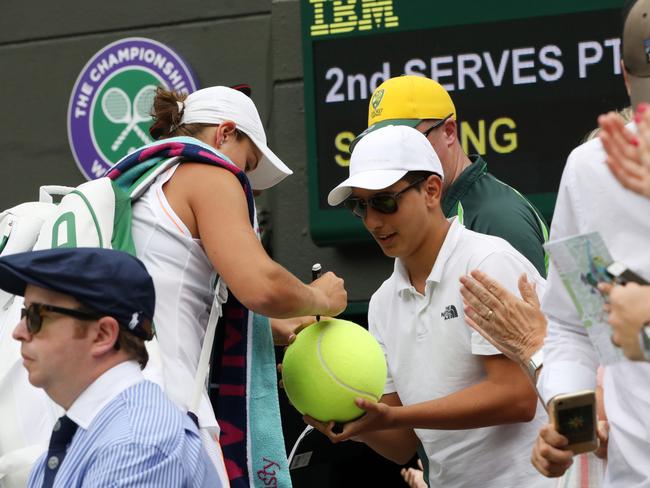 Ash Barty signed autographs for fans after her convincing win. Picture: Ella Pellegrini