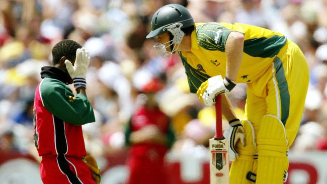 Zimbabwe has not toured Australia since January 2004. Here, Adam Gilchrist (R) checks the eye of wicketkeeper Tatenda Taibu (L) after he was hit by a ball.