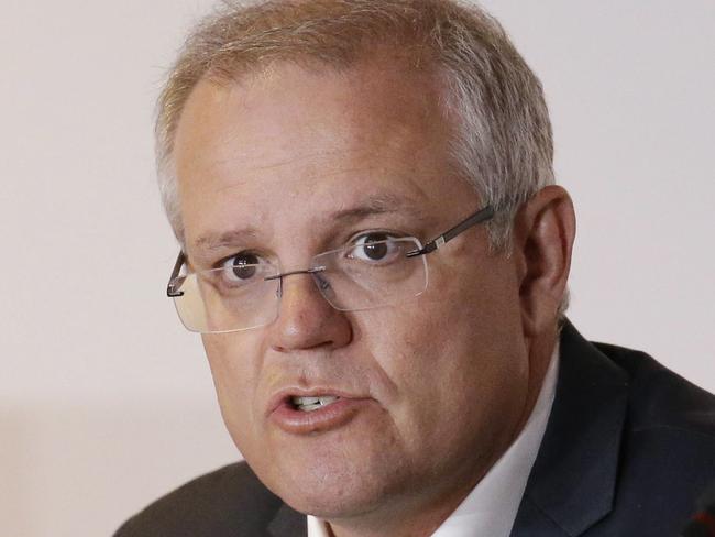 FILE - In this Nov. 18, 2018, file photo, Australian Prime Minister Scott Morrison speaks during the APEC 2018 meetings in Port Moresby, Papua New Guinea. Australia has decided to formally recognize west Jerusalem as Israelâ€™s capital, but wonâ€™t move its embassy until thereâ€™s a peace settlement between Israel and Palestinians, Prime Minister Morrison announced Saturday. (AP Photo/Aaron Favila, File)