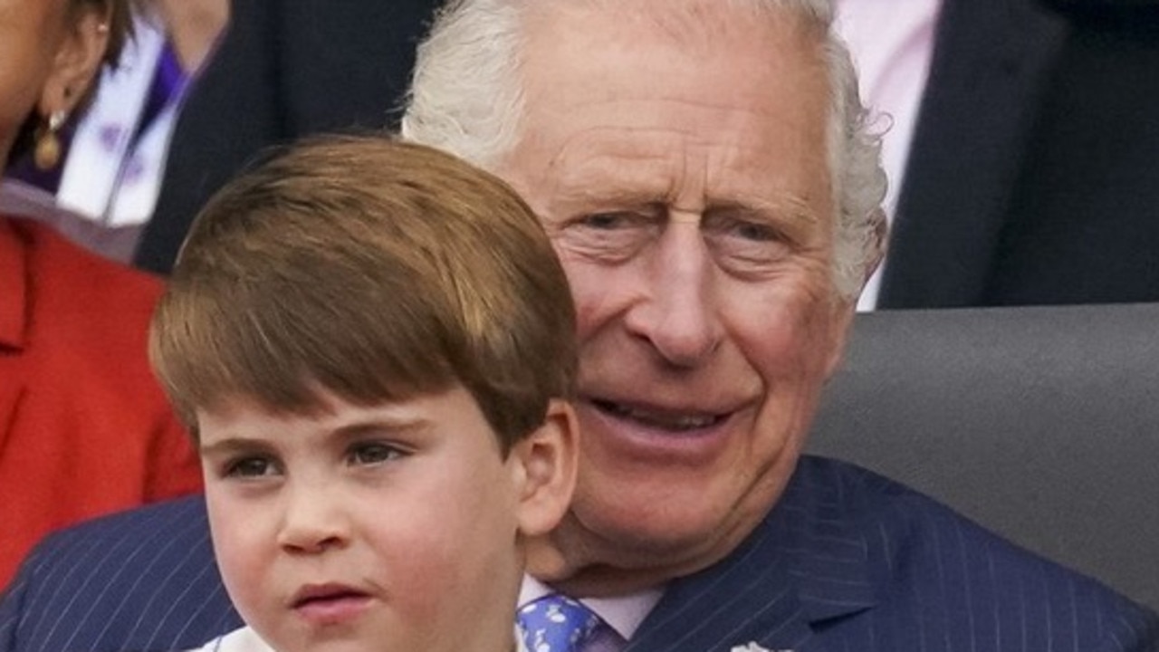 A fidgety Prince Louis sits on his grandfather’s lap at the concert at the end of the concert of the Queen’s Platinum Jubilee. Picture: Arthur Edwards