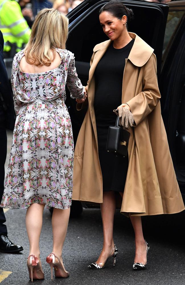 Meghan arrives at St Charles hospital in west London to visit Smart Works, a charity to which she has become patron. Picture: Ben Stansall / AFP