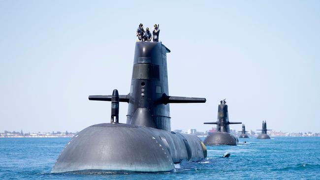 Royal Australian Navy Collins Class Submarines, HMAS Collins, HMAS Farncomb, HMAS Dechaineux and HMAS Sheean sail in formation off Western Australia.