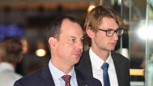 Witness Jeff Pope (left) arrives at the Victorian Royal Commission into Lawyer X. Picture: James Ross/AAP