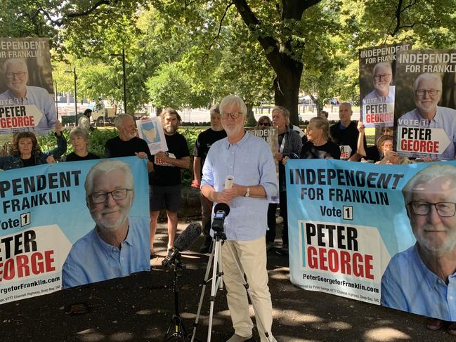 Franklin candidate Peter George announces the back of Climate 200  on Parliament Lawns in Hobart.