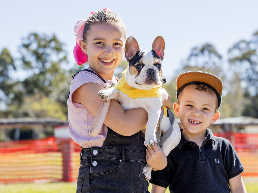 Sienna de Waal, 9, and Kingston de Waal, 5, with Frankie at Paws at the Park held at Mudgeeraba showground on Sunday. Picture: Jerad Williams