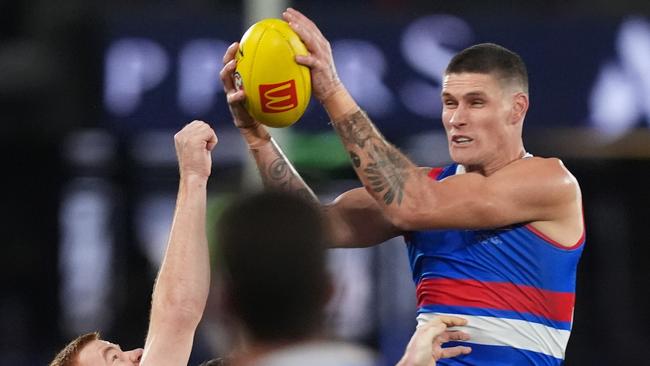 MELBOURNE, AUSTRALIA - JUNE 29: Rory Lobb of the Bulldogs marks the ball during the round 16 AFL match between North Melbourne Kangaroos and Western Bulldogs at Marvel Stadium, on June 29, 2024, in Melbourne, Australia. (Photo by Daniel Pockett/Getty Images)