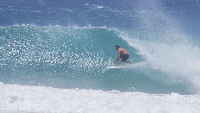 Surfers enjoying the larger swell at Snapper Rocks on Sunday 2 January 2022. Picture: Jerad Williams