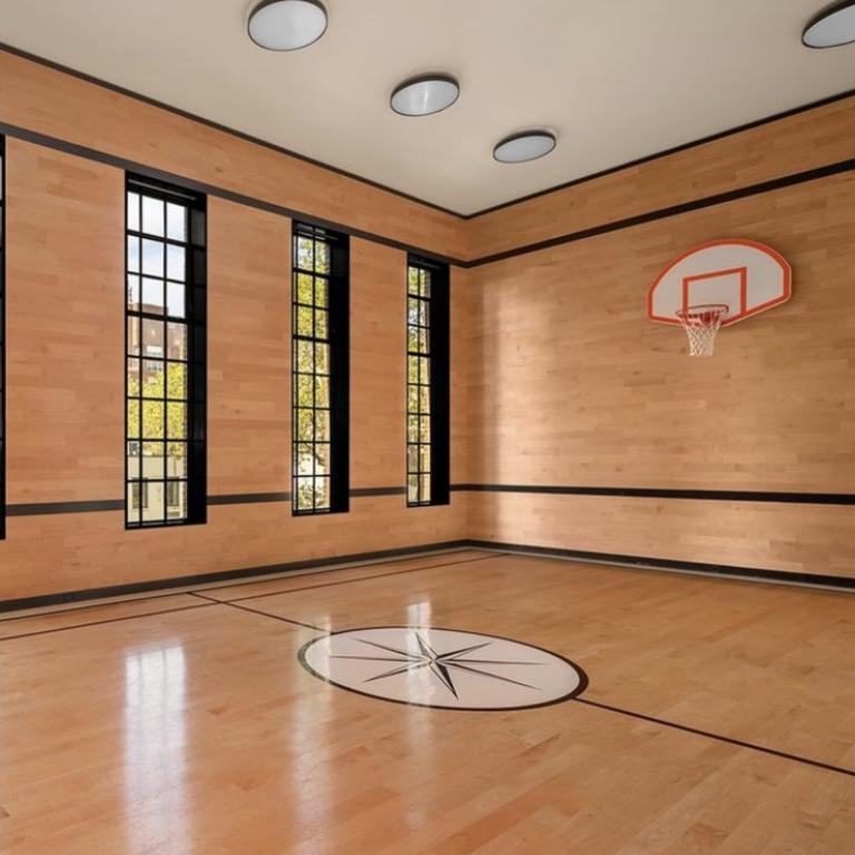 The home also has its own basketball court. Picture: Modlin Group/Instagram/Supplied