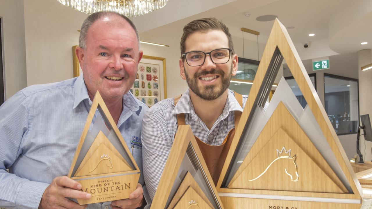 Paul Reedy (left) and Lachlan Hogan, jeweller with the King of the Mountain trophies at Hogans Family Jewellers. Picture: Nev Madsen.