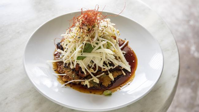 The pork belly okonomiyaki. Picture: Mark Cranitch.