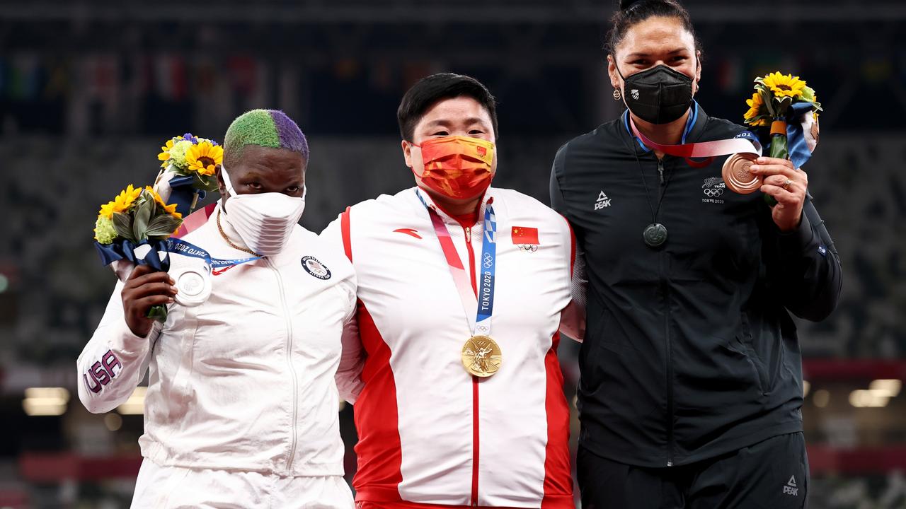 Raven Saunders, Lijiao Gong and Valerie Adams at the medal ceremony for the women's shot put. Picture: Ryan Pierse/Getty Images