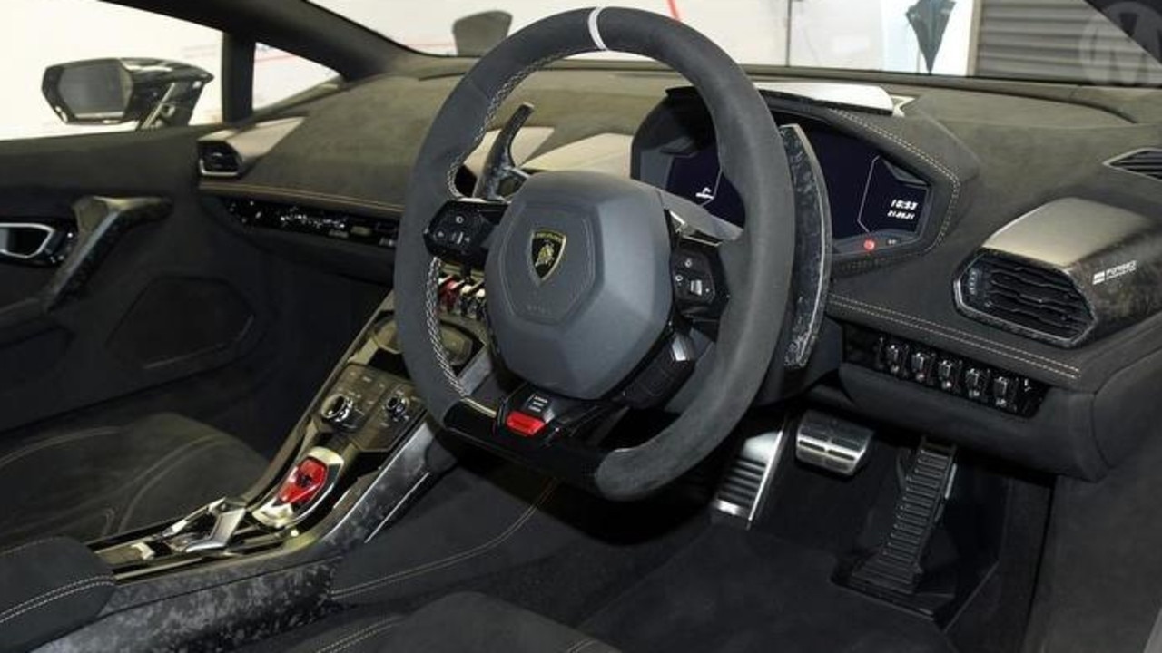 The interior features carbon fibre and suede-like Alcantara.