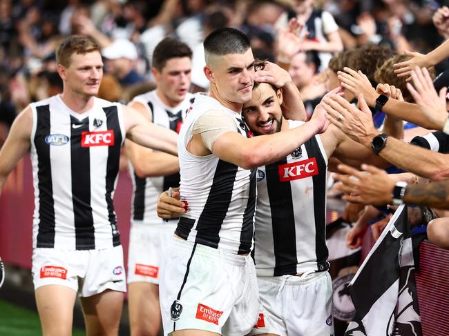 BRISBANE, AUSTRALIA - MARCH 28: Brayden Maynard and Josh Daicos of the Magpies celebrate winning the round three AFL match between Brisbane Lions and Collingwood Magpies at The Gabba, on March 28, 2024, in Brisbane, Australia. (Photo by Chris Hyde/Getty Images)