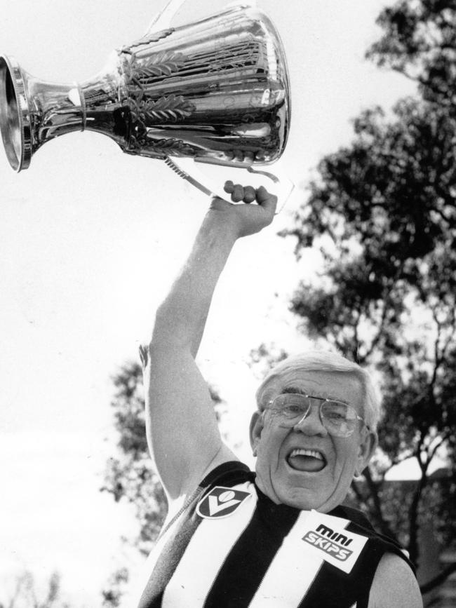 1988. Lou Richards with the VFL premiership cup. Picture: COLIN BULL.