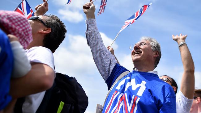 People wave Union flags as they attend a rally for 'Britain Stronger in Europe', the official 'Remain' campaign group seeking to avoid Brexit. Picture: AFP